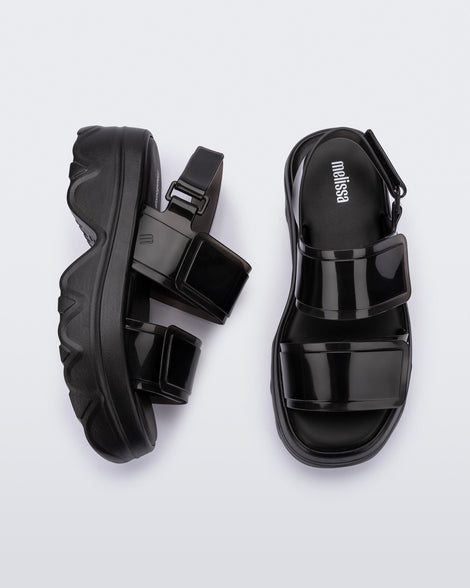 Top and side view of a pair of black Melissa Brave Platform sandals.