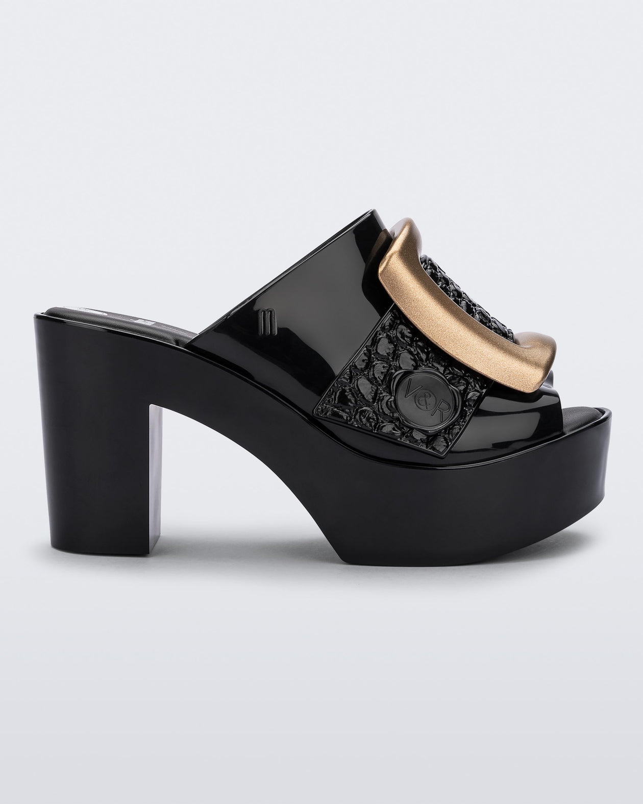 Side view of black Meilssa Buckle Up platform heel mule with gold buckle..