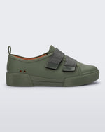 Side view of a pair of green/orange Melissa Cool sneaker with an orange insole, green base and two green velcro straps.