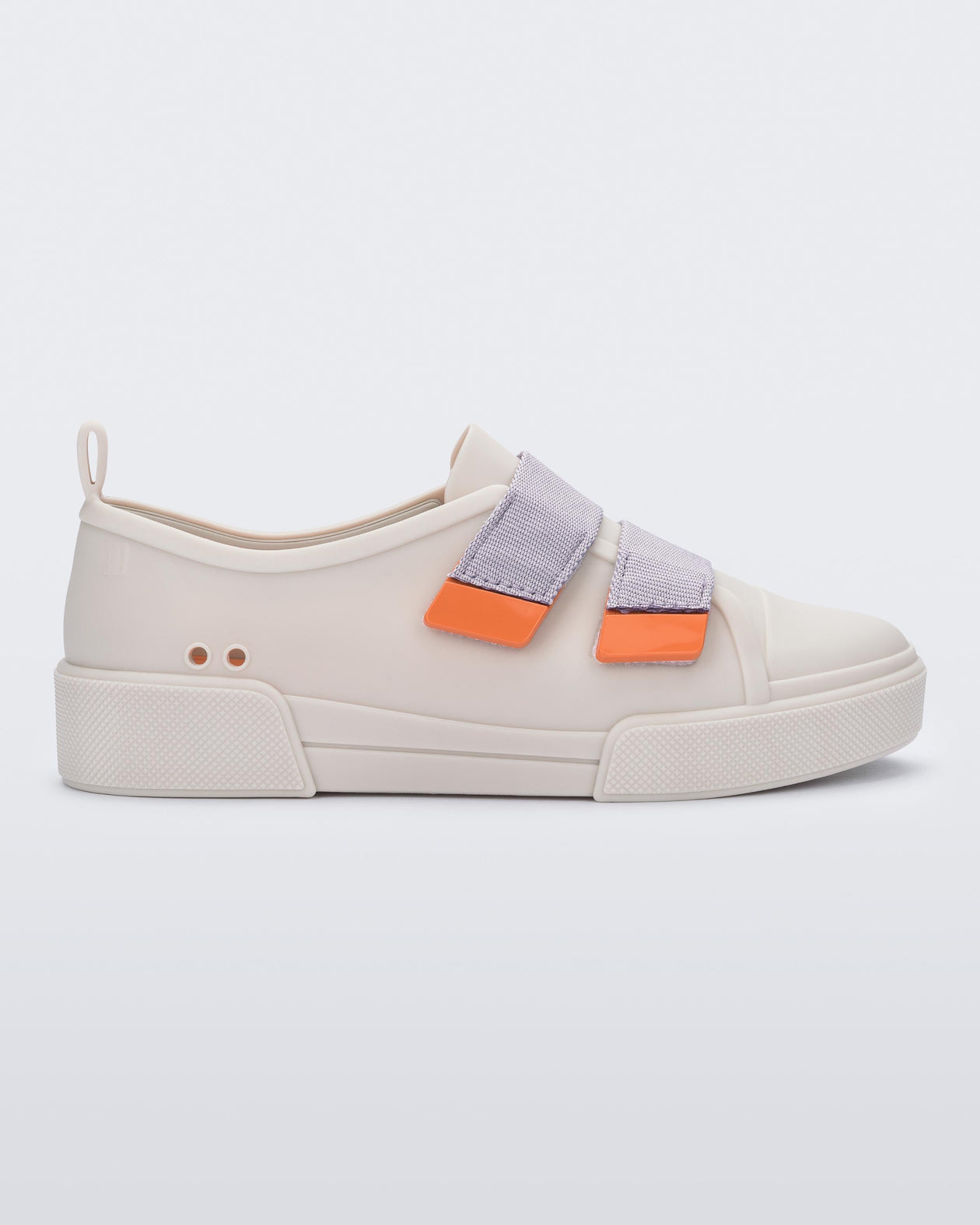 Side view of a matte beige/lilac Melissa Cool sneaker with two orange and lilac velcro straps.