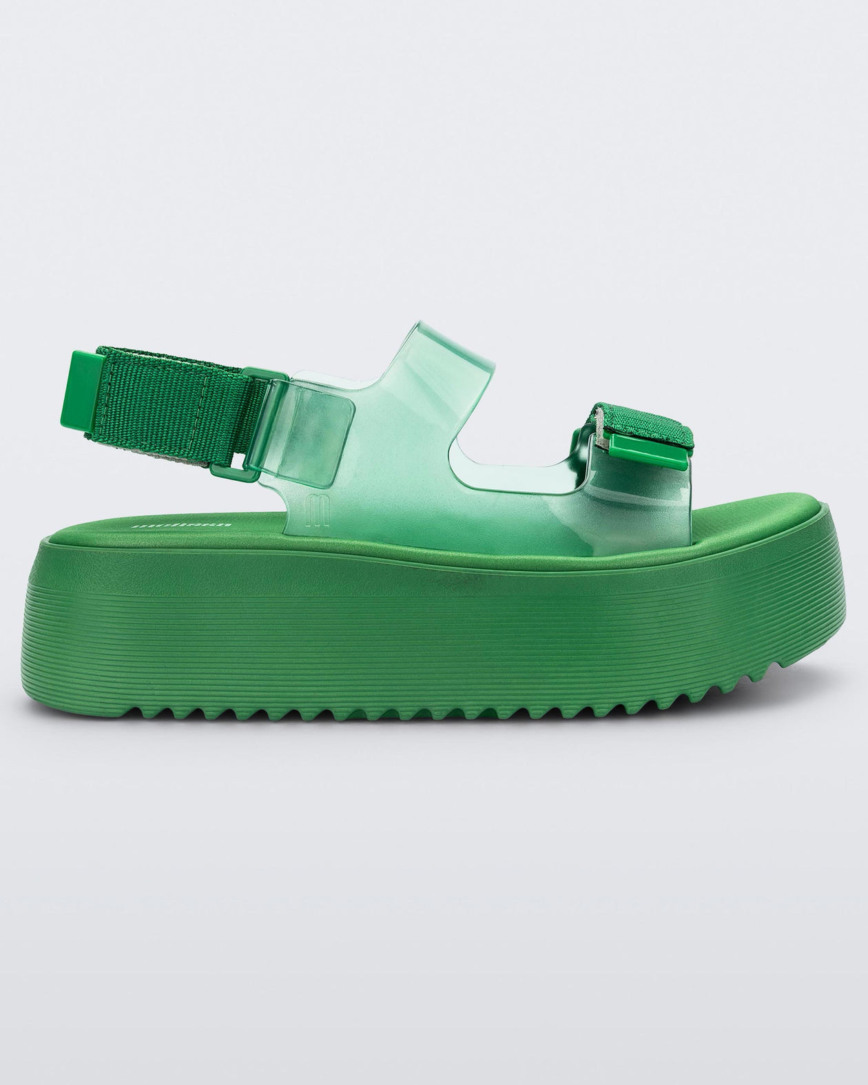 Side view of green Melissa Brave Papete Platform sandal.