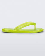 Side view of green Melissa Airbubble Flip Flop.
