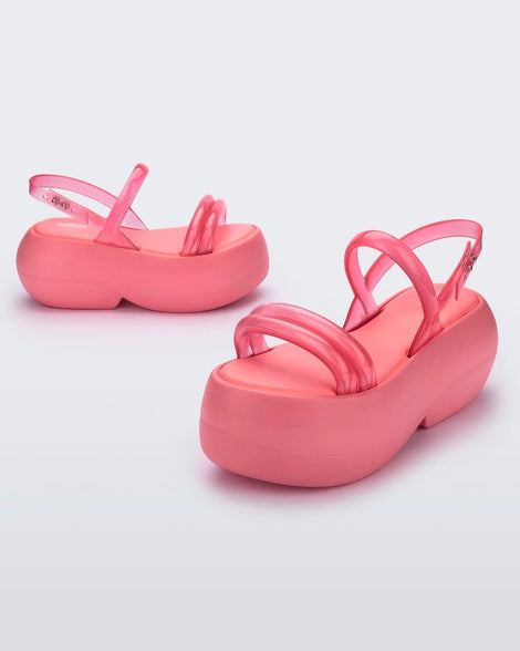 Angled view of a pair of pink Melissa Airbubble Platform sandals.