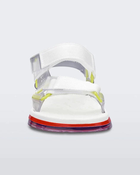 Front view of a white Melissa Papete sandal with yellow and red accents.