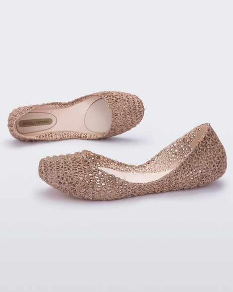 Top and side view of a pair of beige Melissa Campana ballet flats.