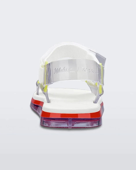 Back view of a white and red Melissa Papete sandal with white and clear straps.