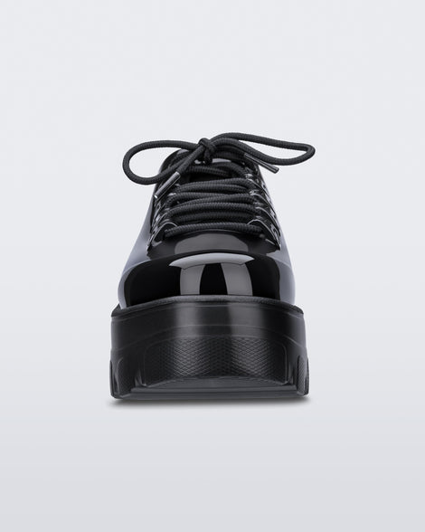 Front view of a black platform Melissa Kick Off Sneakers with laces.